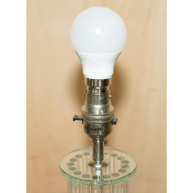 This very cool designer table lamp with multi-column pillared trunk made up of 17 glass tubes A very good looking well...