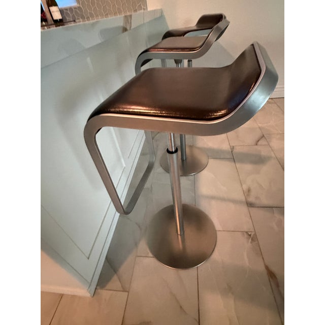 For sale is a set of three authentic, made in Italy LaPalma LEM barstools. Genuine Italian brown leather seats, brushed...