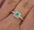 0.61 Carat Emerald and Diamond Ring in 14K White Gold. Beautiful vintage-style Emerald ring with round-cut diamonds...