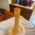 The yellow murano glass vase features a unique scavo (meaning "dug up" or "excavated") surface. This technique gives the...