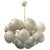 Italian oval shaped chandelier with 24 Murano pebble glass shades mounted on brass frame in unlacquered natural brass...