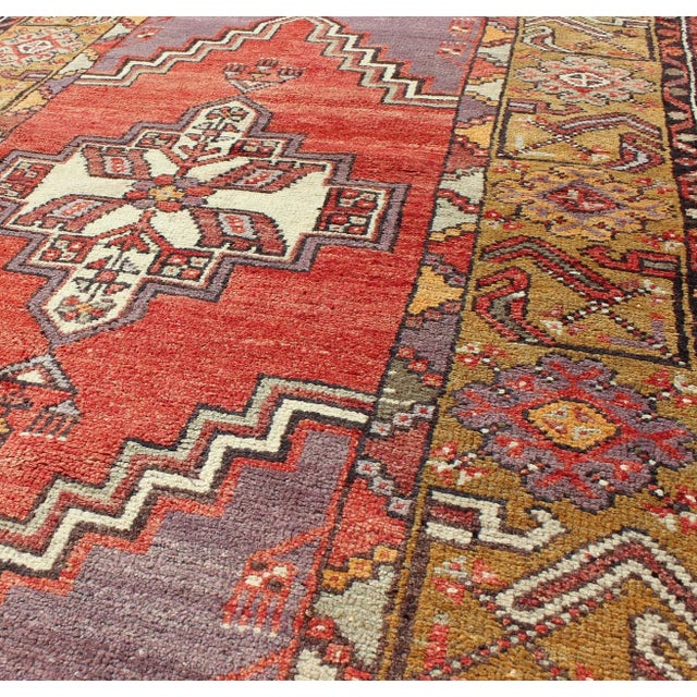 Mid 20th Century Geometric Vintage Turkish Oushak Carpet in Soft Red, Light Purple, & Gold Border For Sale - Image 5 of 7