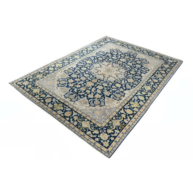 A classic hand-knotted Kashan oriental rug with impressive charisma and artistic elegance. The finely crafted central...