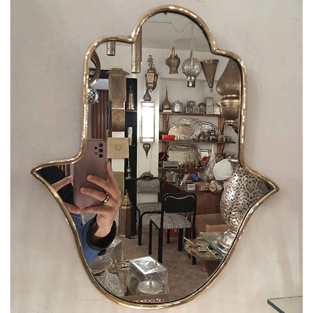 This stunning handmade brass mirror is a true work of art, handcrafted by skilled artisans in Marakesh. The intricate...