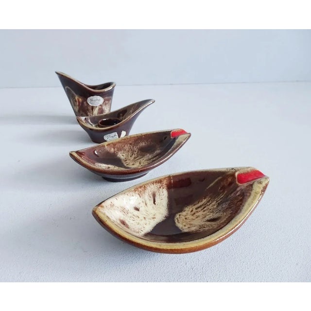Stylish Smoking Set from the 1950s of Jasba ceramics. The compilation consists of two small ashtrays, a tray for storage...