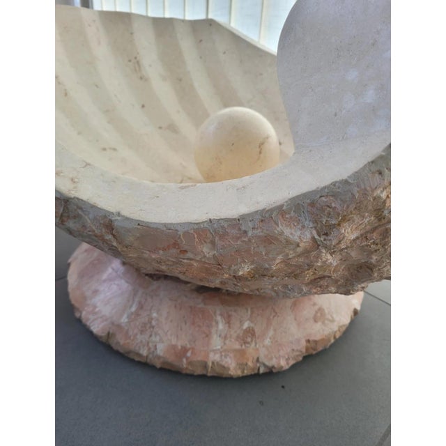 Postmodern coffee table in Magnussen stone, Ponte Mactan - 1980s Made of Mactan stone. Oyster-shaped with a semiprecious...