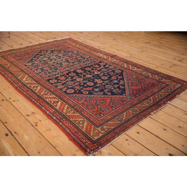 :: Allover covered field in a Herati design motif with corner spandrel overlays bearing concentric boteh design motif...