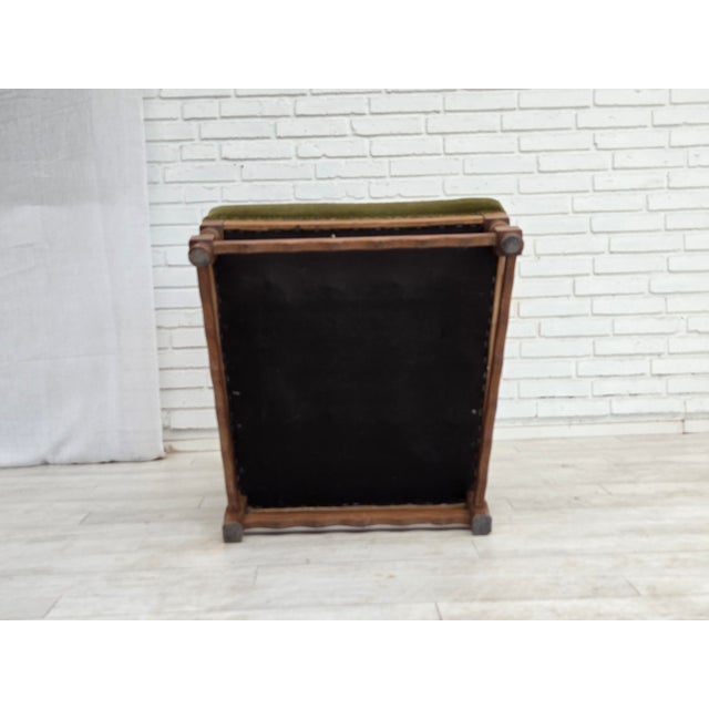 1960s, Danish highback wingback armchair. Original green furniture velour, oak wood, brass springs in the seat. Original...