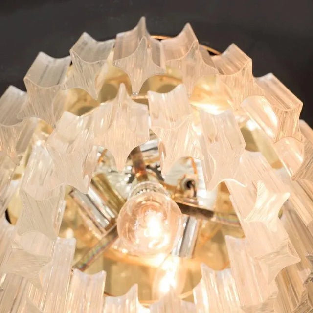 A chic Mid-Century modernist two-tiered flush mount chandelier by Camer. Quadriedri (four-sided) hand-blown Murano prisms...