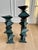 An exceptional signed pair of monumental sculptural modernist candlesticks executed in solid cast bronze with a richly...