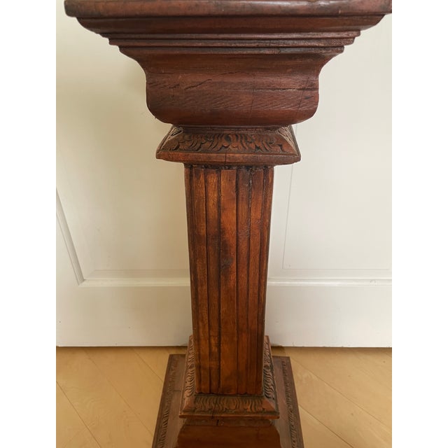 Antique Wooden Carved Column Pedestal Plant Stand This antique wooden carved column pedestal plant stand is a charming...