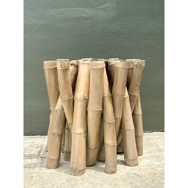 This vintage Budji twisted bamboo dining table pedestal is a sculptural expression of organic craftsmanship and mid-...