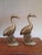 Presenting not just one, but a delightful pair of solid brass cranes. Although there is no maker's mark, these pieces are...