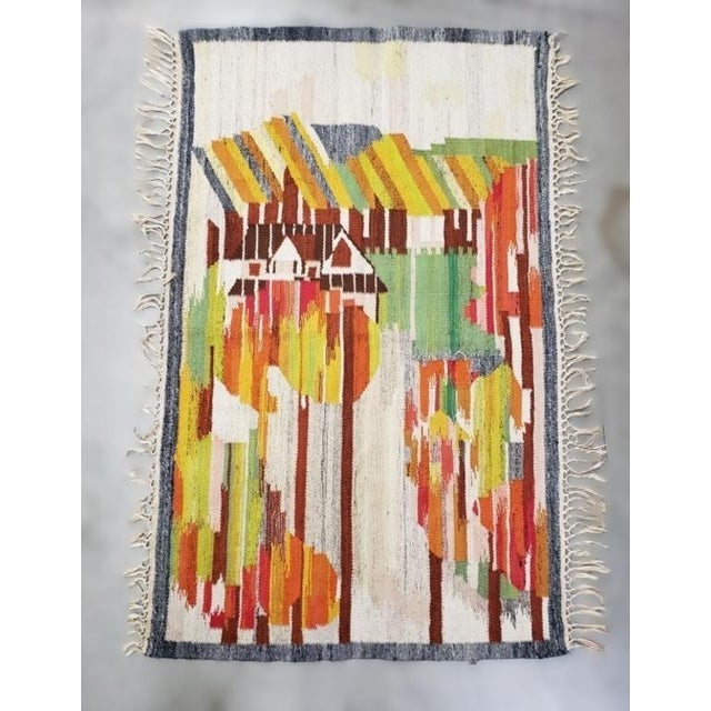 A museum-quality example of Mid-Century Polish folk art, this hand-woven wool Kilim was designed by the celebrated artist...