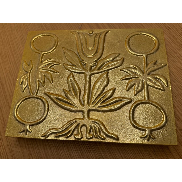 This beautiful box is crafted from cast aluminum with a polished brass finish. Smooth sides are paired with a removable...