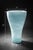 Hand-blown aqua art glass vase with swirling white pattern and substantial weight—an organic modern statement piece that...