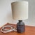 A small and beautifully resolved stoneware table lamp from the celebrated blue series by einar johansen for søholm...