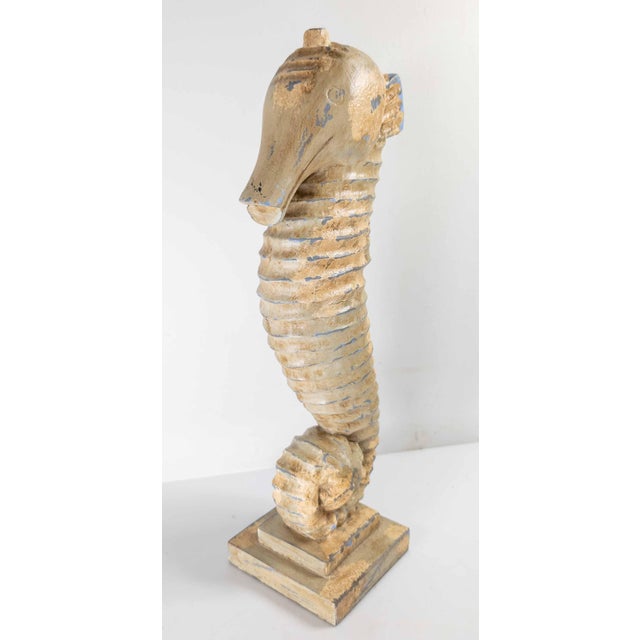 We are selling this great decorative folk art style carved Seahorse. This seahorse has multilayered paint with white and...