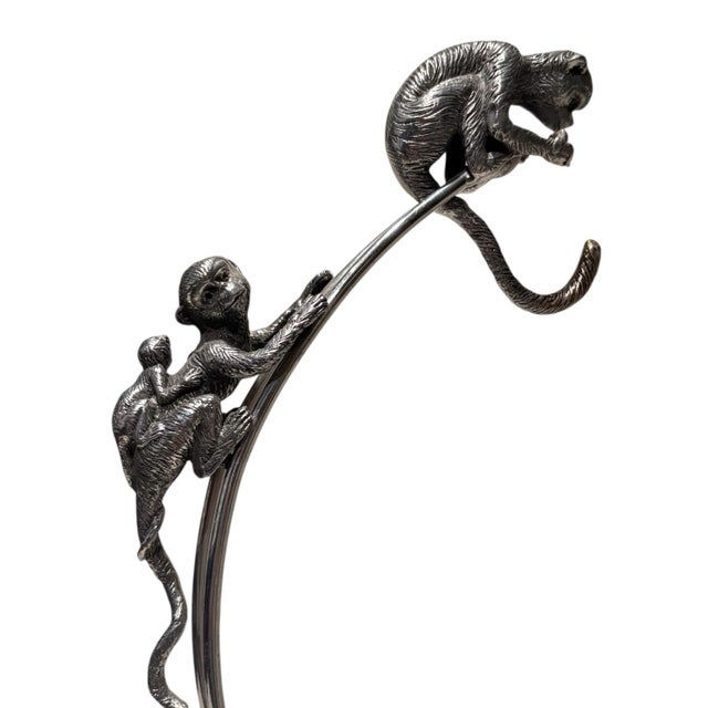 A rare and whimsical vintage Arthur Court aluminum fruit stand featuring beautifully detailed climbing monkeys. The...