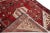 Beautiful Vintage Persian hand-knotted Wool runner rug with the red field. This Persian rug has a multicolor accents in...