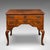 This is an antique lowboy. An English, walnut correspondence or scholar's table, dating to the Georgian period, circa...
