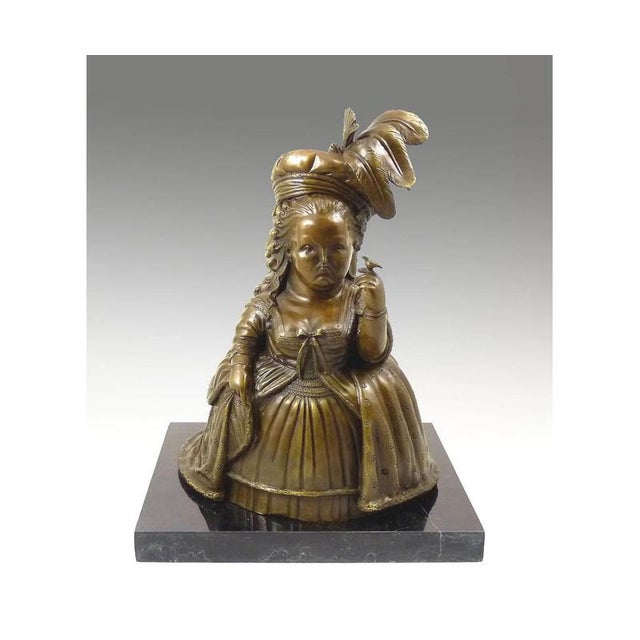 This solid bronze sculpture represents Marie Antoinette, the last queen of France, reinterpreted through the artistic...