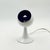 A sculptural table lamp featuring an elegant tulip-shaped base and a distinctive spherical shade with a striking purple...