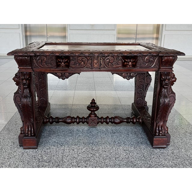 Crafted in the Late 19th Century from white oak, this desk has beautifully hand-carved details that place it in the family...