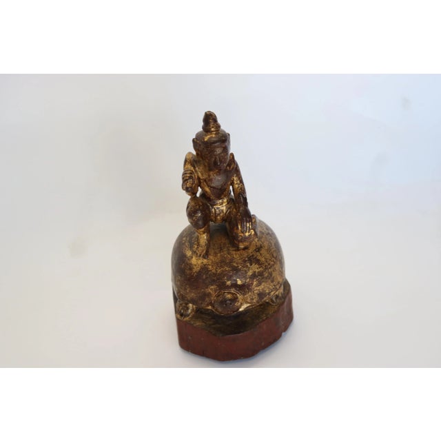 Burmese wood angel riding on a turtle, Early 20th c.