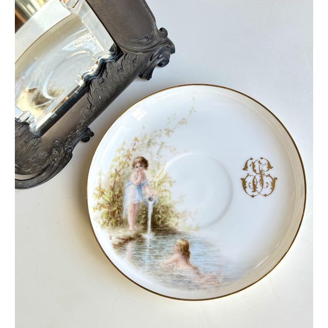 A superb example of early 20th-century european art nouveau porcelain, this finely crafted plate features an enchanting...