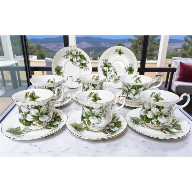 The Royal Albert Trillium 6-piece teacup and saucer set is a set of coffee or tea cups with matching saucers, crafted from...