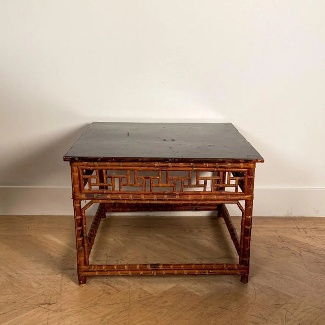 A late 19th Century Chinese bamboo and black lacquer square low table, circa 1880. Was $1750