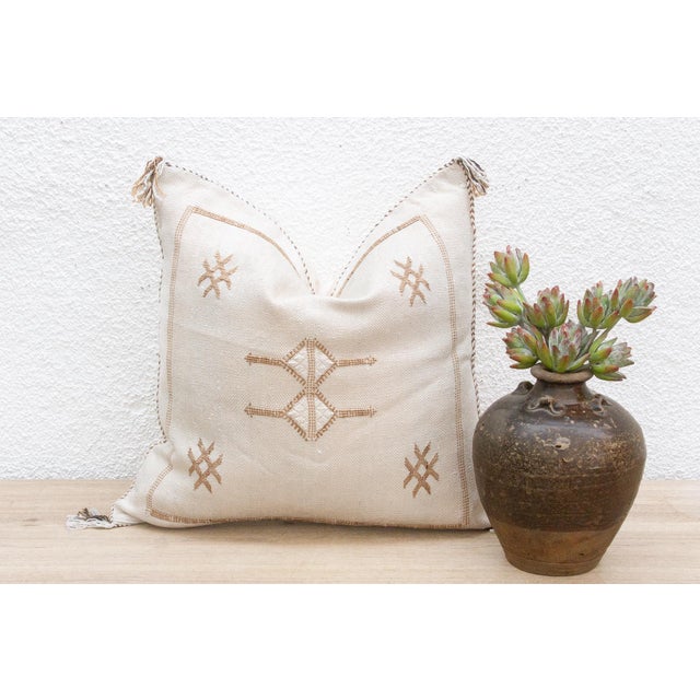 Introduce a touch of organic artistry to your home with our handcrafted 18-inch square cactus silk pillow cover. Woven...