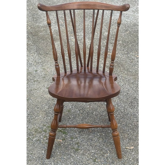 Rare set of classic fiddleback chairs by Pennsylvania House. Features solid cherry wood, fiddleback with turned side...