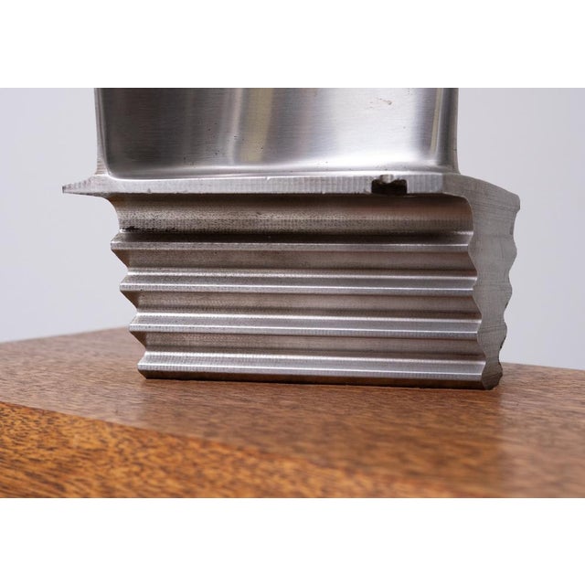 Stunning Men Cave or Desk accessory. Original jet engine or turbine window (blade) on a thick solid Oak stand. Turbine...