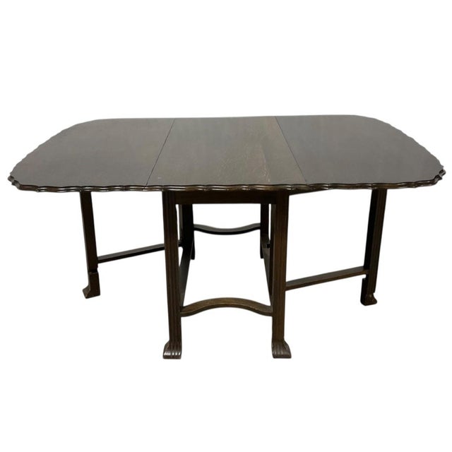 Condition Used - Good Date Range 1920-1929 Elegant vintage drop-leaf dining table crafted in the classic Duncan Phyfe /...