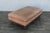 A handsome oversized vintage leather ottoman with a warm, sophisticated look reminiscent of classic Ralph Lauren...