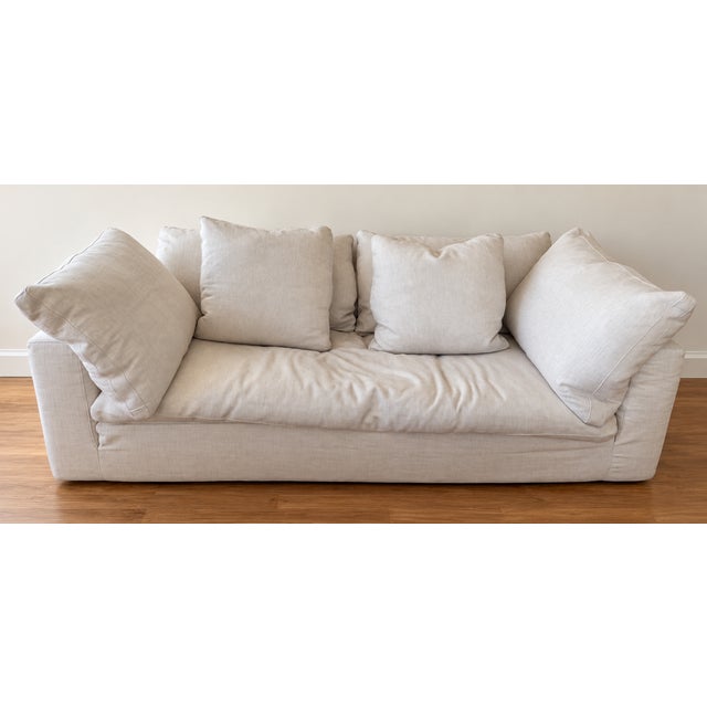 RH Cloud Bench-Cushion Sofa in off-white textured upholstery, featuring a single bench cushion, deep seating, and plush...