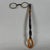 An elegant and slender vintage optical instrument, featuring an unusual and refined handle and a pocket-sized design with...