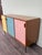 This piece of furniture, made in Italy in the 1960s, immediately strikes a balance between functionality and decorative...