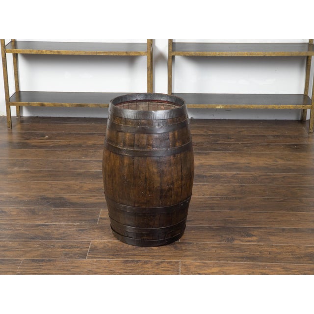 An English rustic oak barrel from the late 19th century, with iron braces. Created in England during the last decade of...