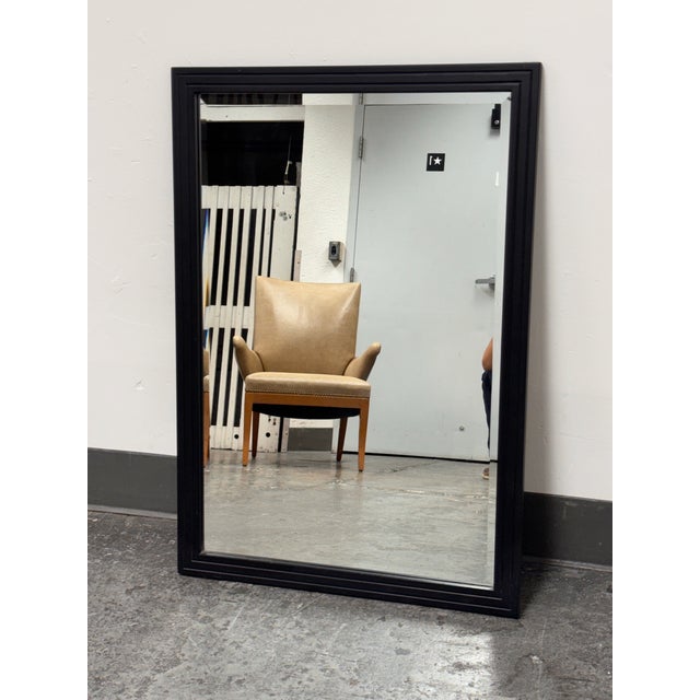 Design Plus Gallery presents a Black Framed Beveled Wall Mirror from Stanley Works. This rectangular wall mirror has a...