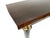 An elegant French console table from the 1960s, featuring a beautifully balanced mid-century design. The piece stands out...