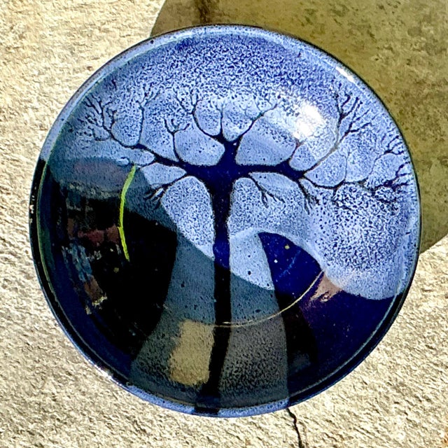 This Vintage Boho Studio Pottery Tree Bowl is a captivating piece of artisanal craftsmanship that blends natural...