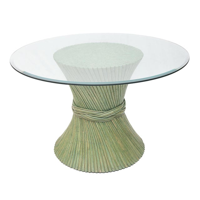 Rattan lounge set. Aqua green. Made by Maugrion for Roche Bobois. One round table with beveled glass top. No chips or...