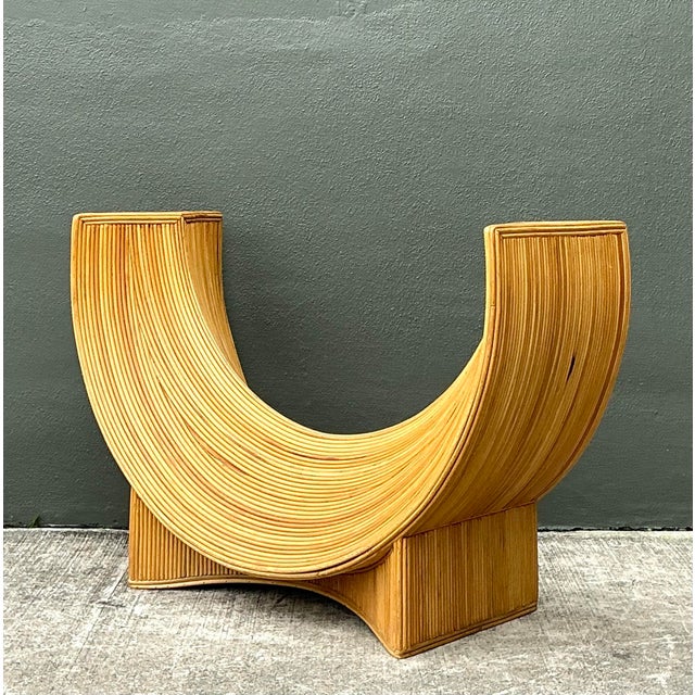 This striking sculptural table base captures the essence of 1970s organic modernism with its dramatic crescent silhouette...