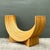 This striking sculptural table base captures the essence of 1970s organic modernism with its dramatic crescent silhouette...
