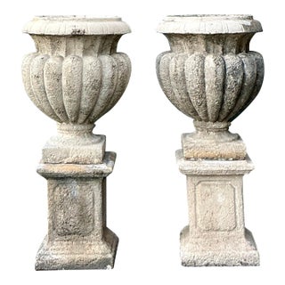 Vintage Regency Cast Concrete Urns on Pedestals - A Pair For Sale