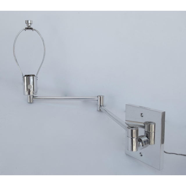Vintage: C. 1970s Georg Hanson for Hanson Lighting Co., chrome-plated over steel , swing-arm wall sconce, made by...