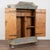 This lovely pine armoire still maintains the quality and details of the original hand-painted finish with background tones...